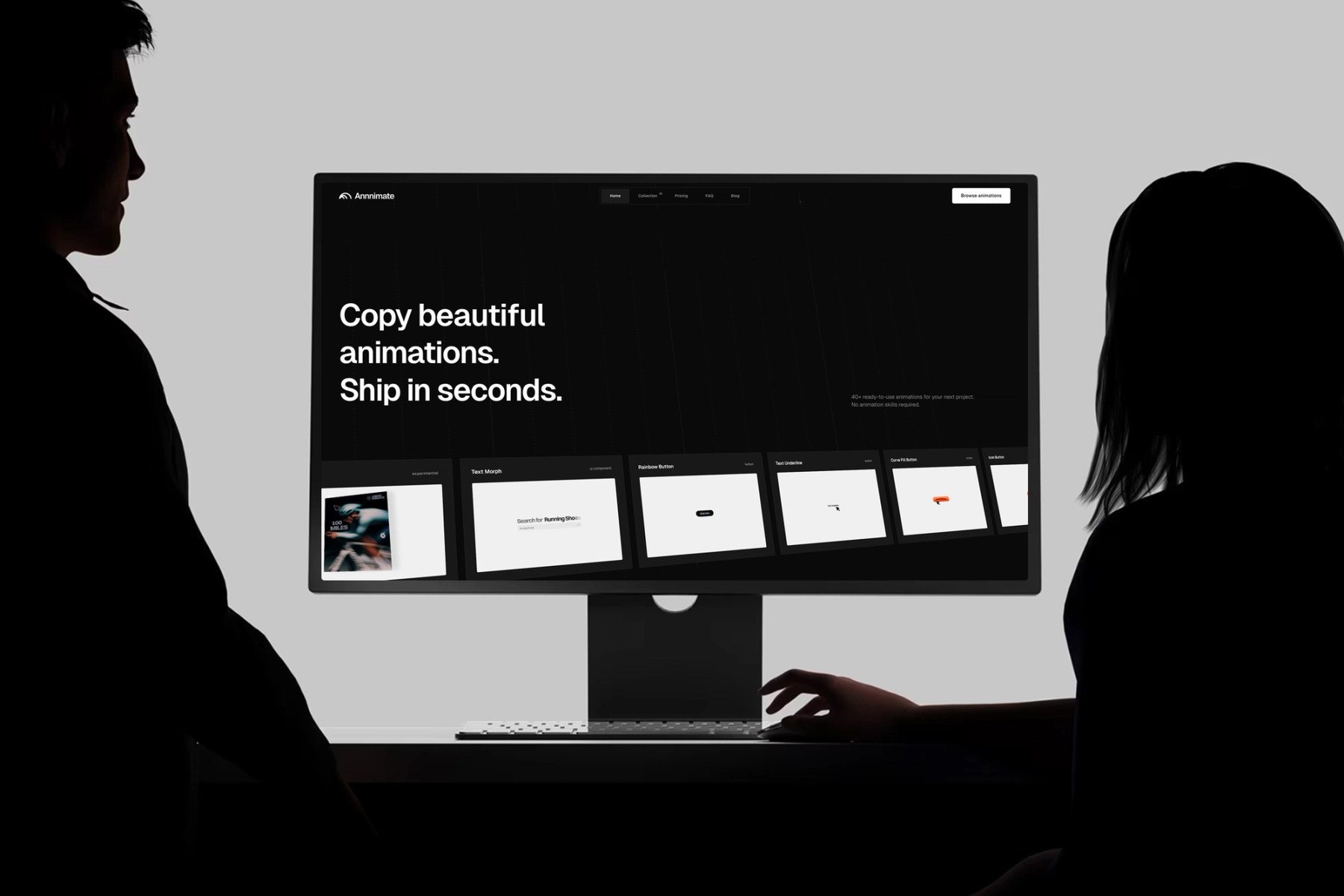 Hai người đang xem ứng dụng web Annnimate trên màn hình máy tính
